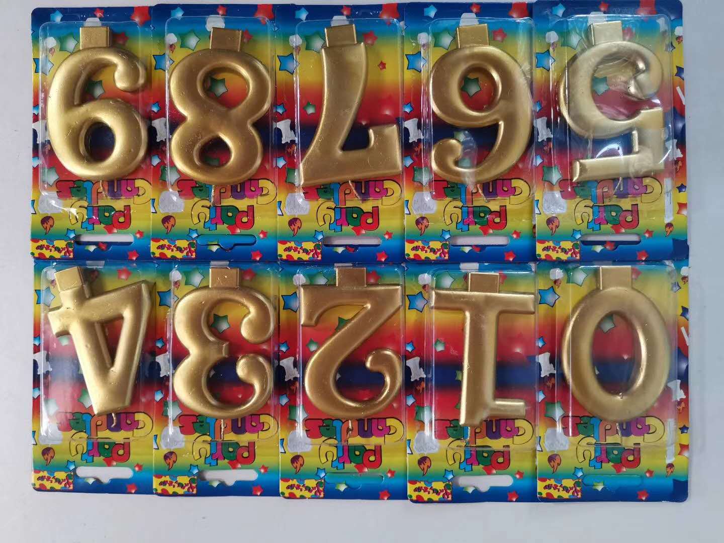 Upscale birthday cake decorated with gold number 4 full figure