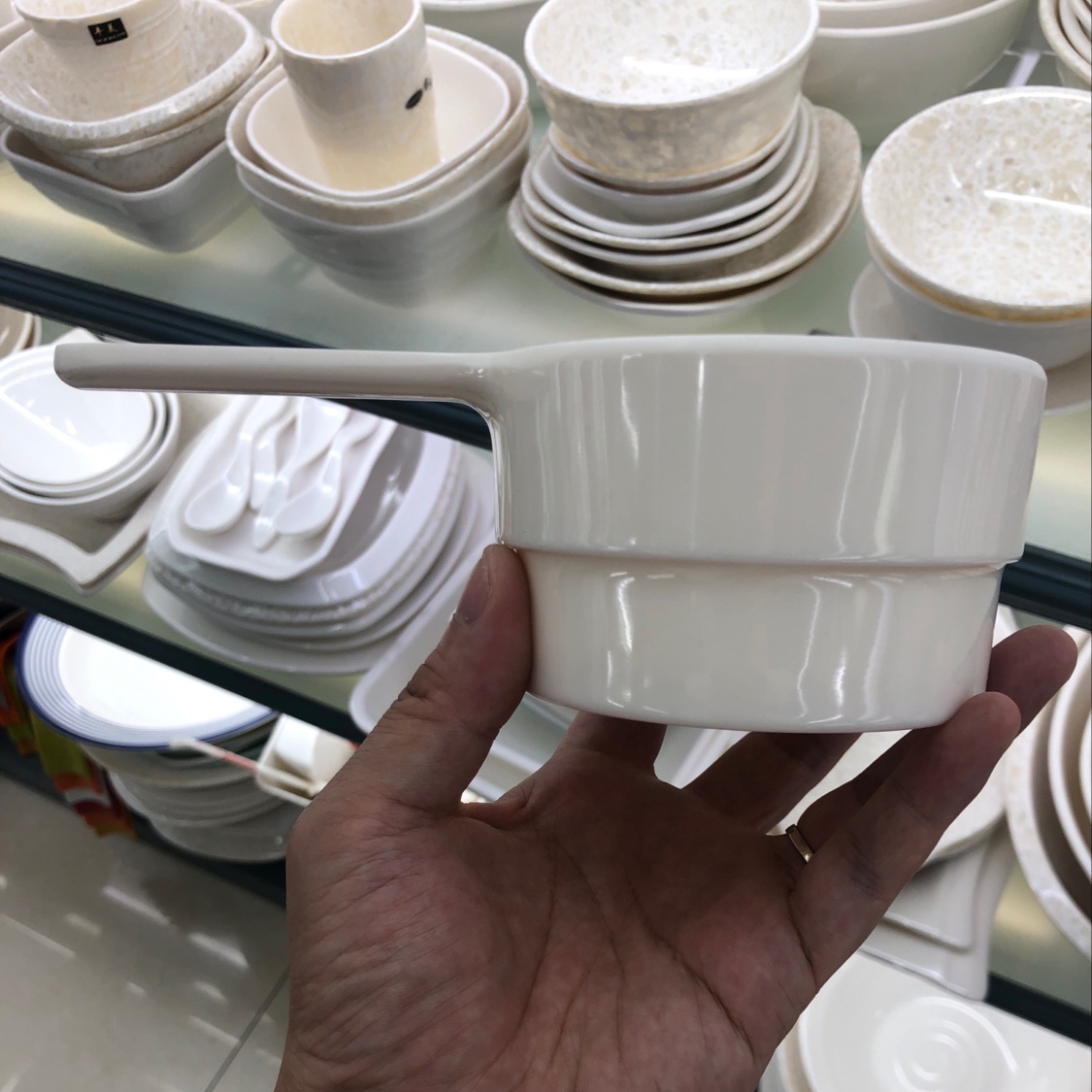 A small soup bowl with a handle details Picture