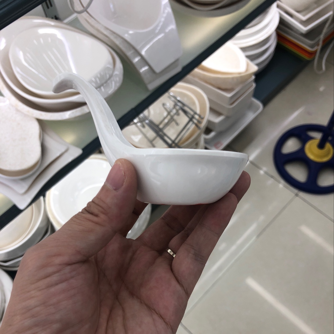 A small dish with a handle details Picture