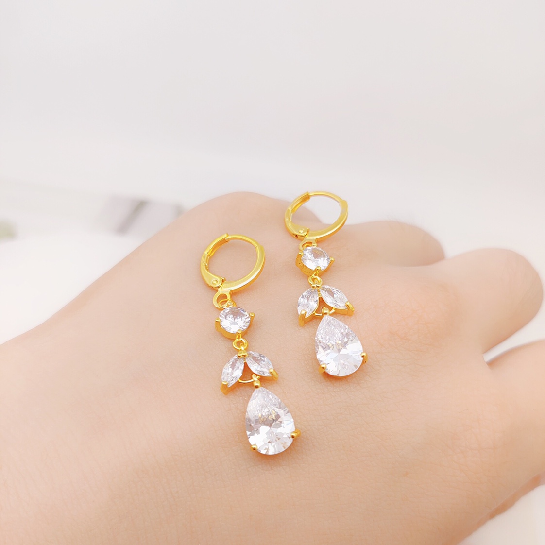 Zircon triple earrings