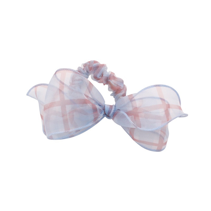 The yarn is knotted and the cloth is looped