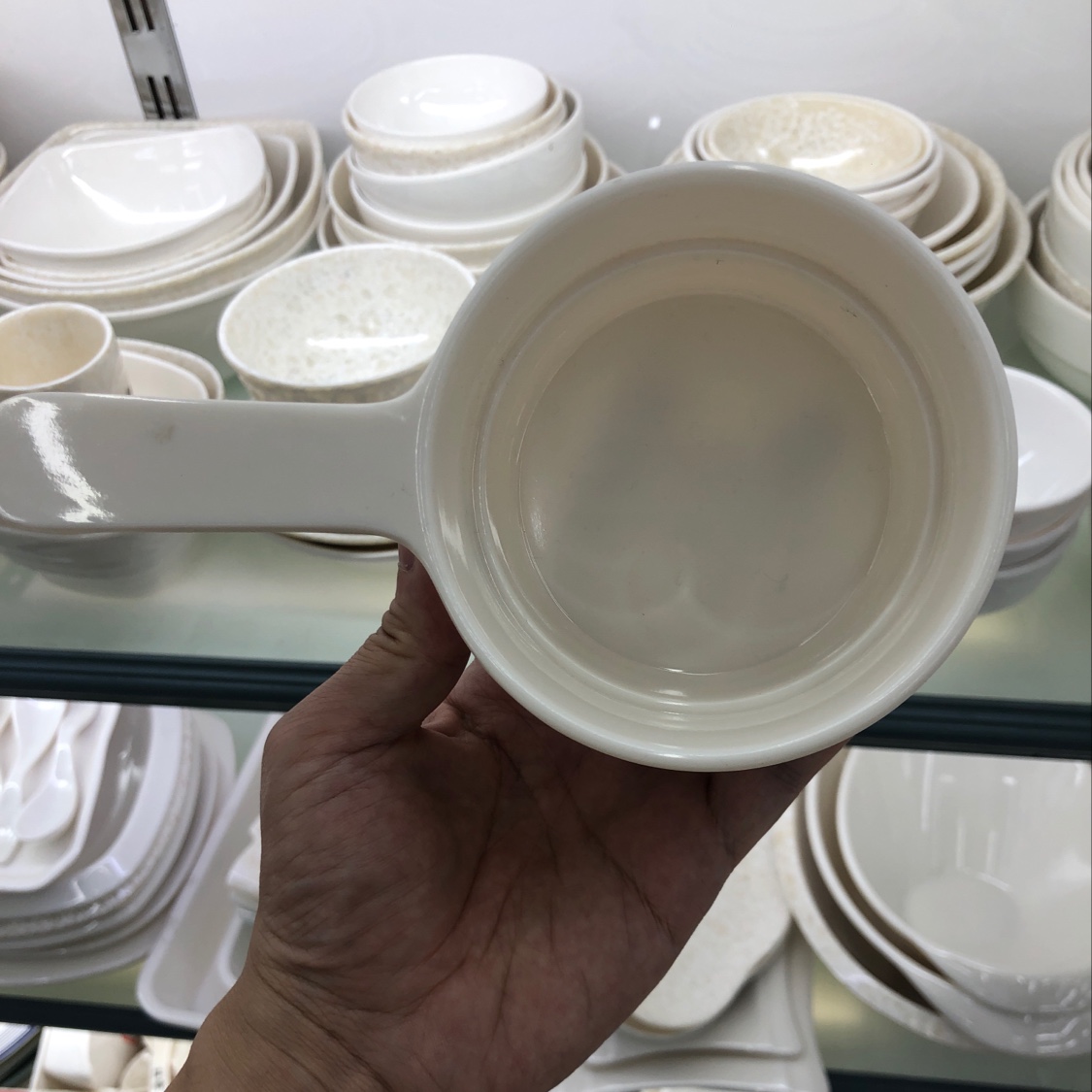 A small soup bowl with a handle
