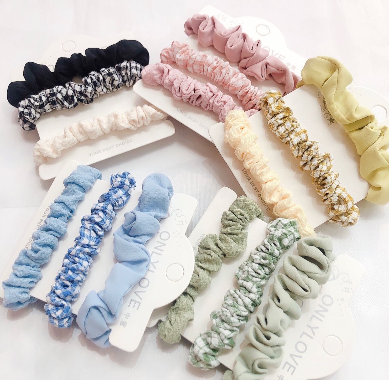 A 3-piece set of snap-fit fabric hair ties with a fresh and clean checkered autumn hair band