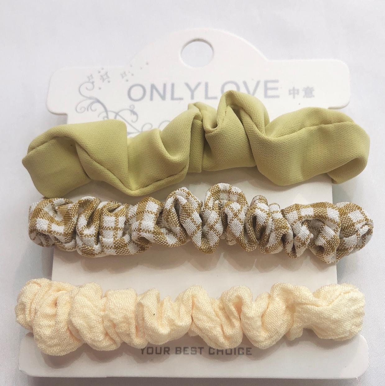 A 3-piece set of snap-fit fabric hair ties with a fresh and clean checkered autumn hair band undefined