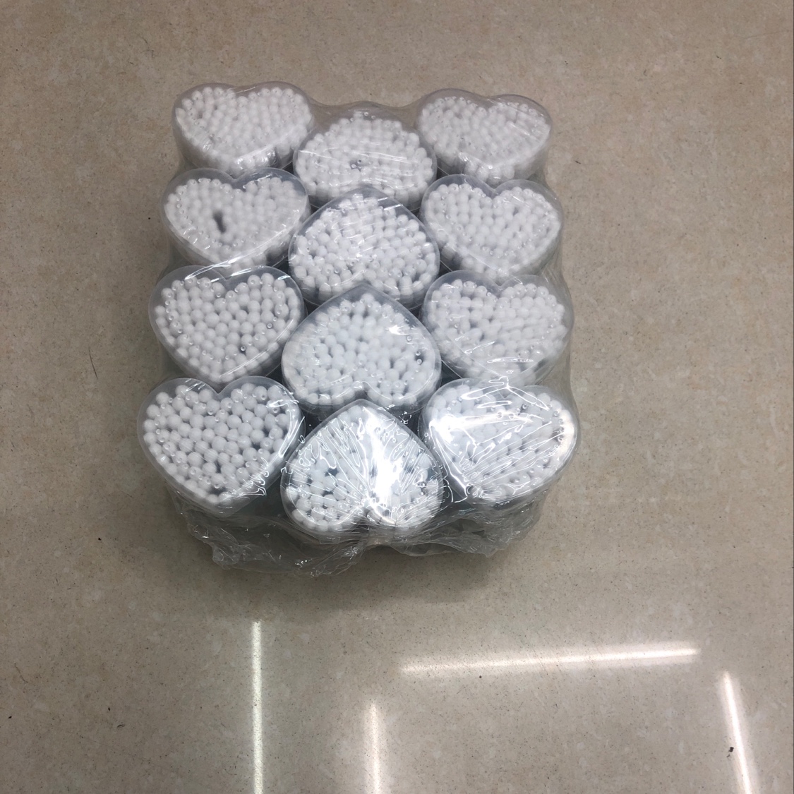 Cotton swabs in little love bottles