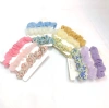 A set of 3 pieces of fabric clips for a hair tie with a fresh and delicate floral pattern details Picture