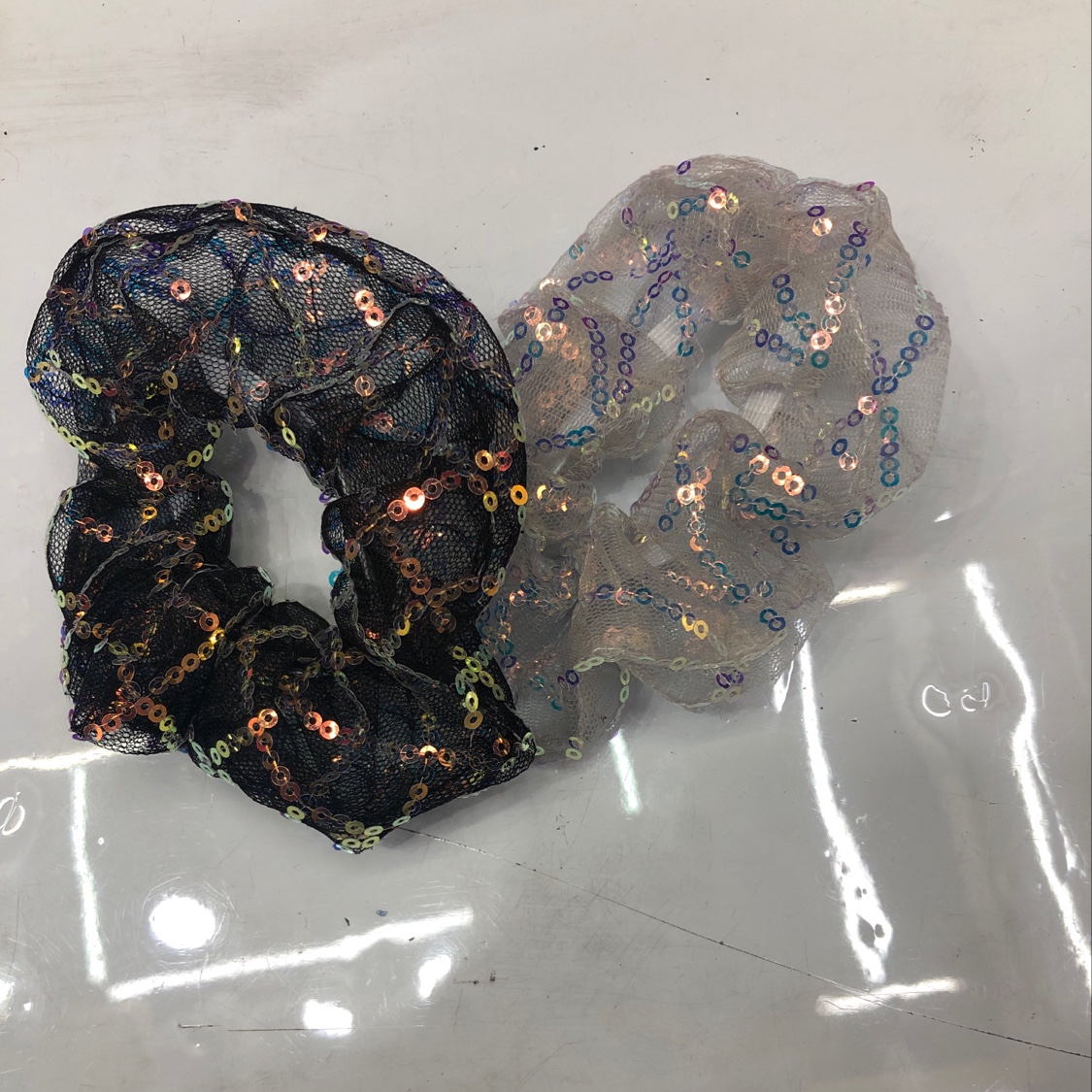 The tulle sequined hair band is so colorful and delightful. It's a hair band that everyone wants just by looking at it