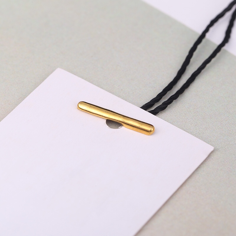 Pin, thread buckle, hanging particle, tag rope, gold thread, black thread, thread buckle Application Scenario