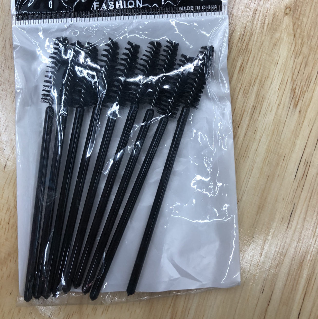 Twelve mascara brushes