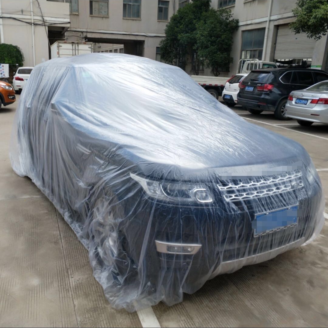 The car cover is transparent and disposable