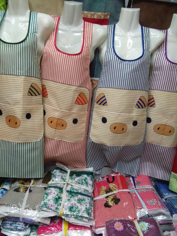 Korean apron with slanted peach chest and curved bow thumbnail