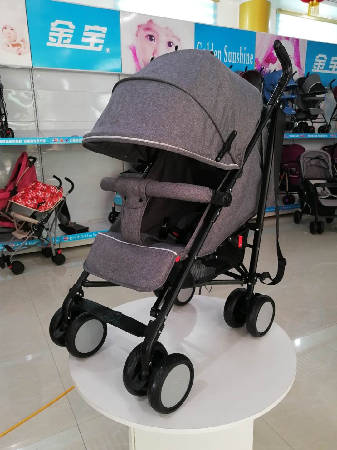 轻便可折叠婴儿伞把推车/可加脚