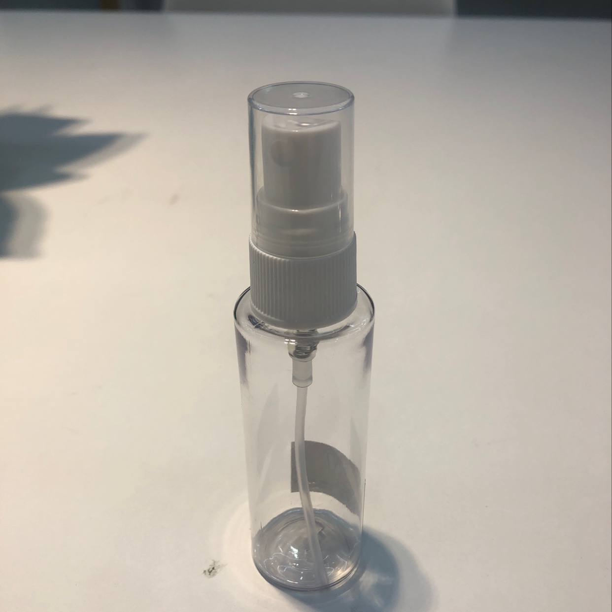 Transparent spray bottle