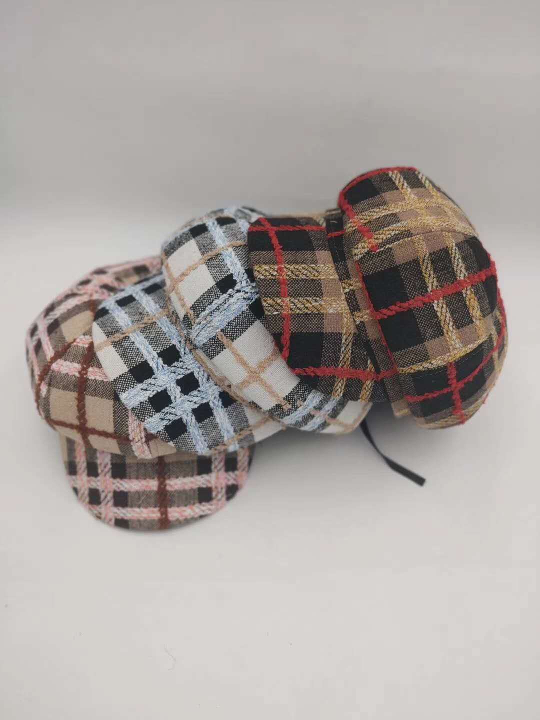 A large checkered octagonal hat details Picture