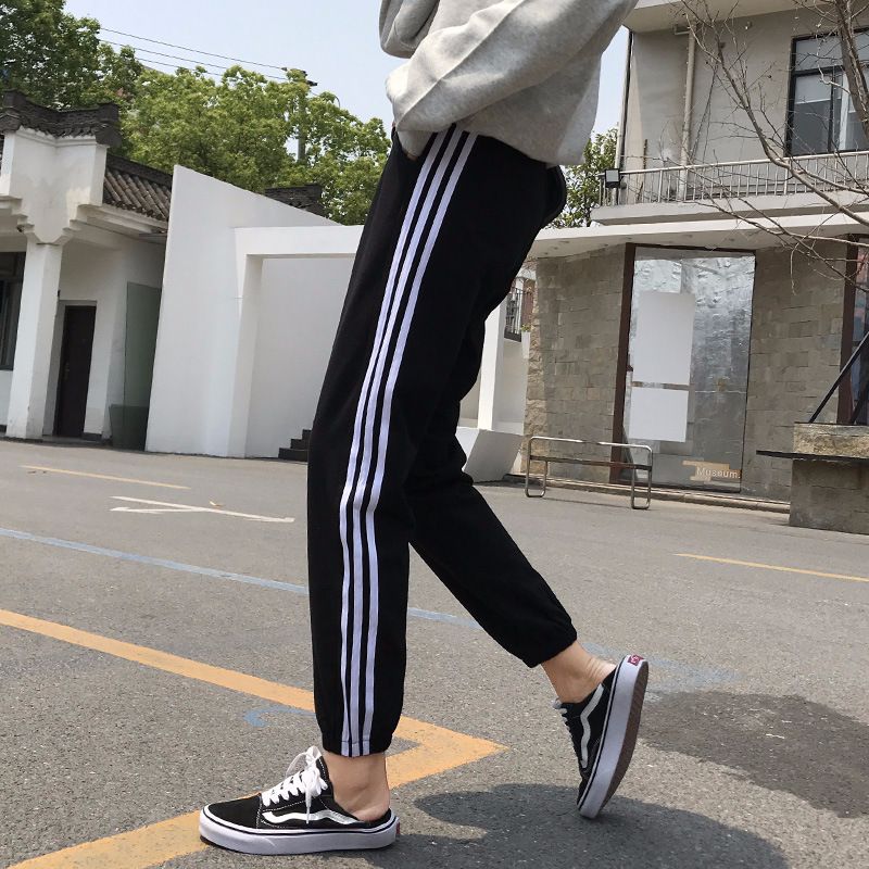 亿贝彩休闲运动裤女三边条裤宽松束脚显瘦学生黑色裤子新款秋女裤细节图