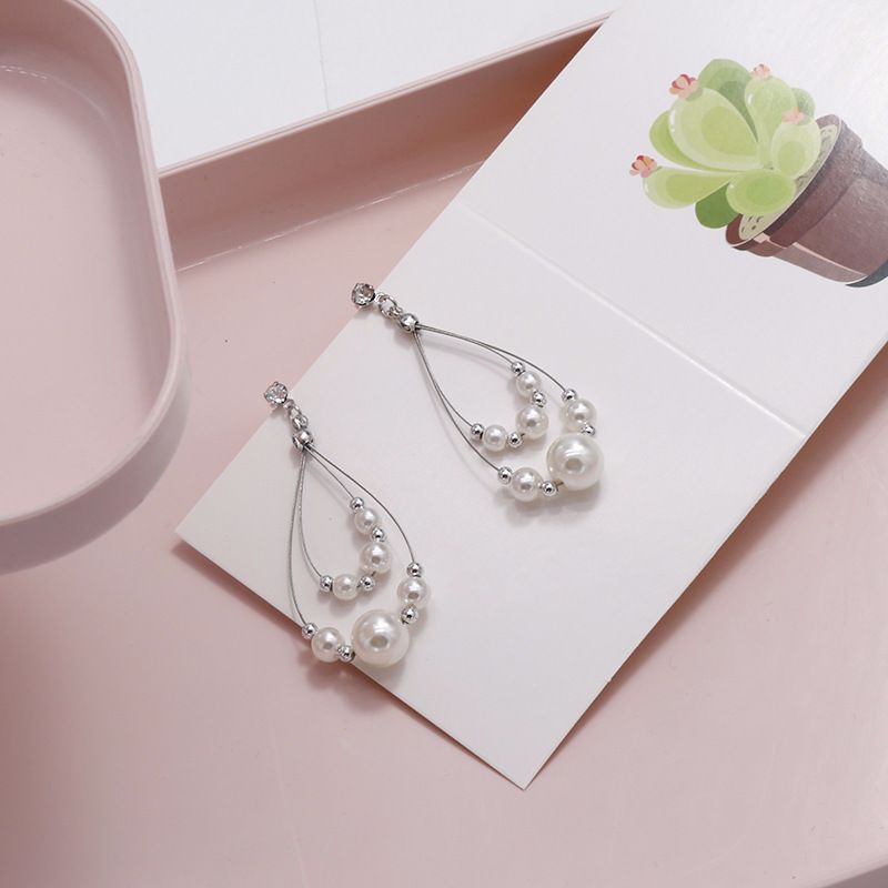 Minimalist Earrings French aesthetic pearl earrings fairies long earrings retro gentle temperament minority earrings thumbnail