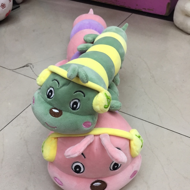 A caterpillar playing music on all sides details Picture
