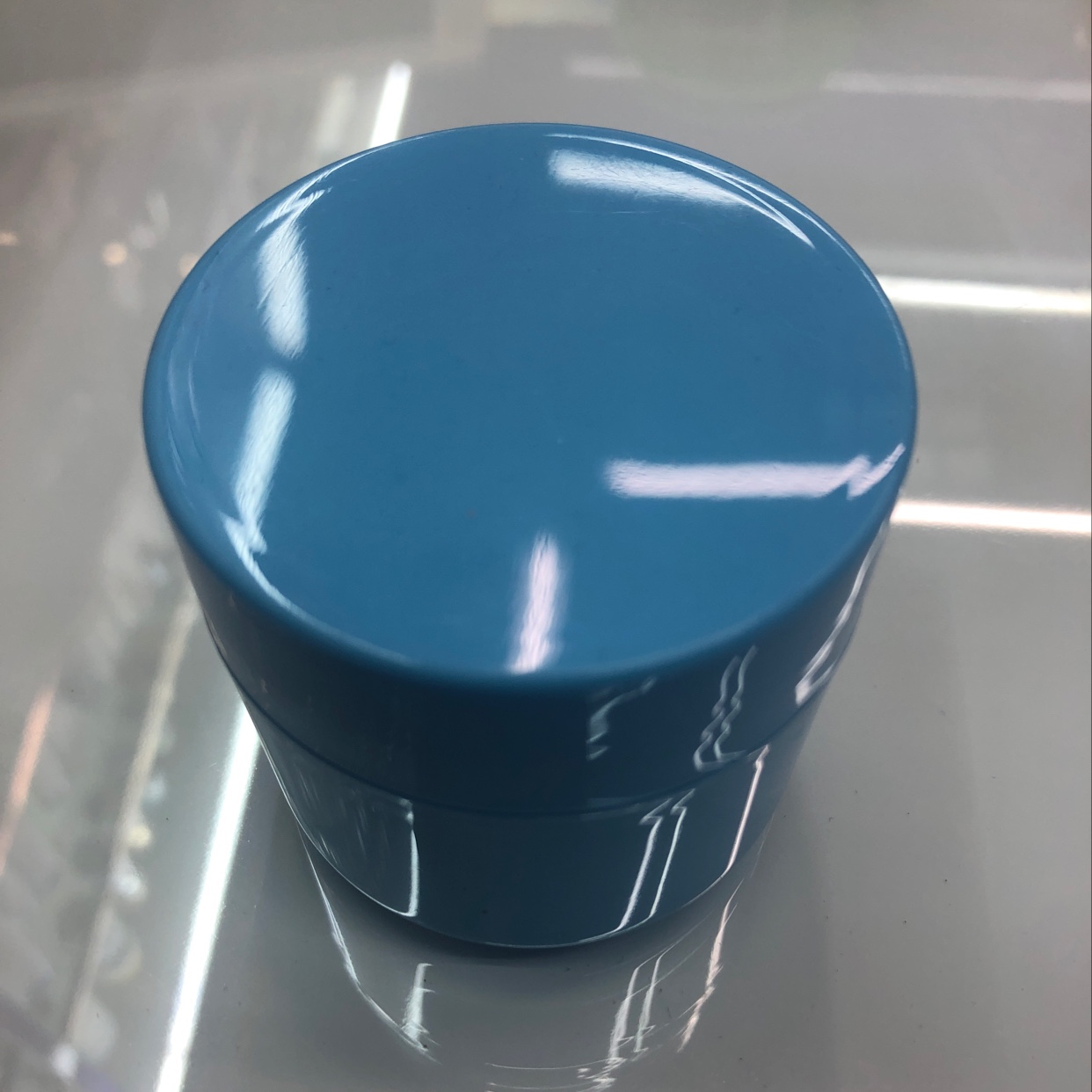 Light blue cream bottle
