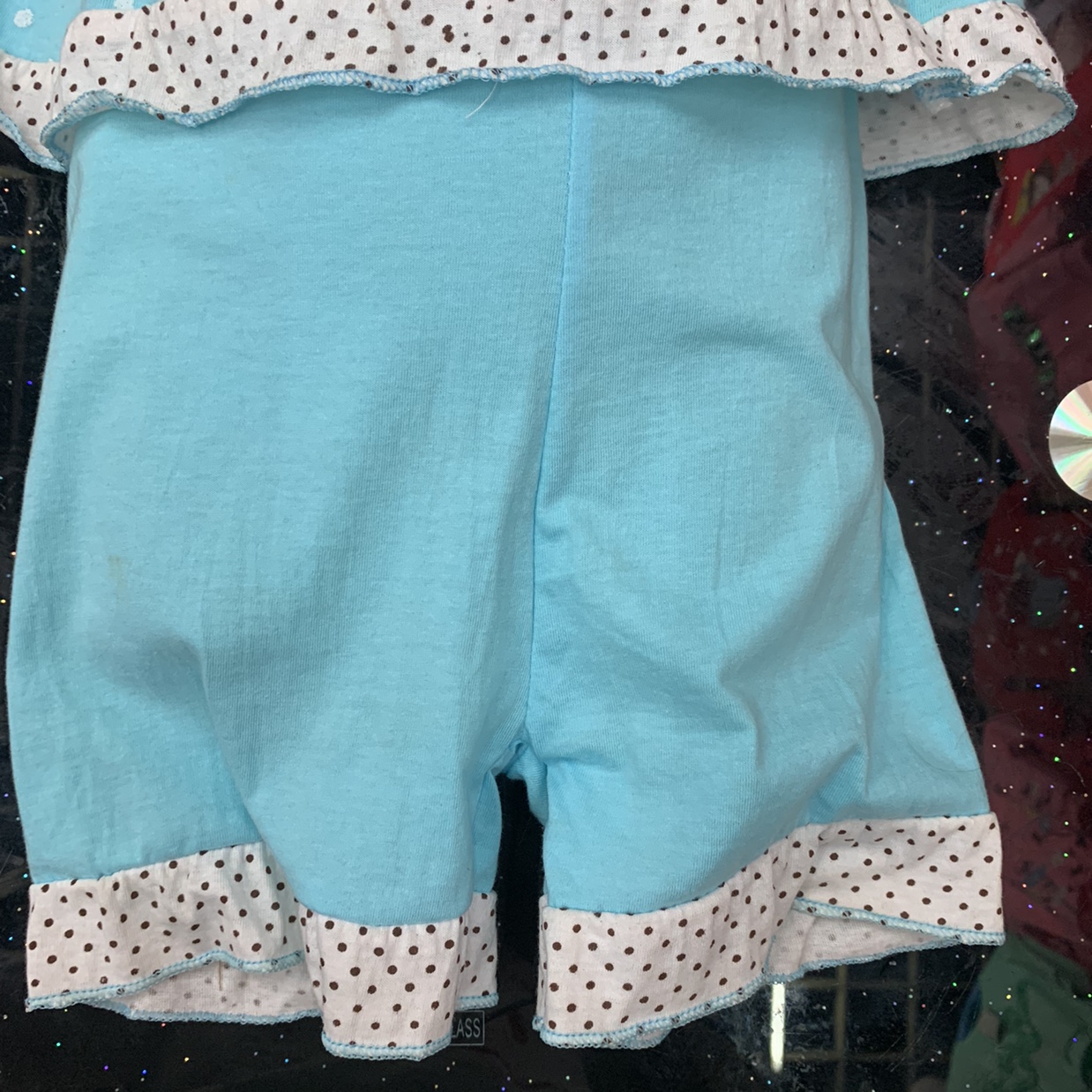 A girl with a bow spot short-sleeved shirt Specification image