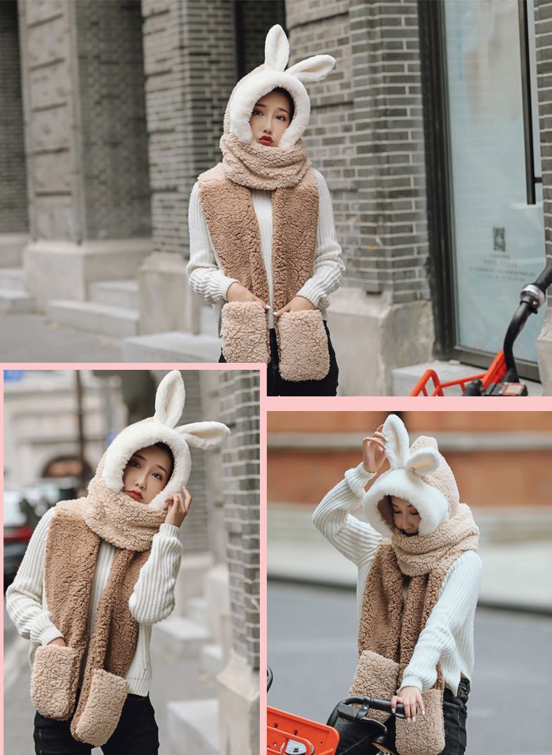 In winter, a sweet and cute Korean woman is wearing a three-piece hat, a scarf and a set of gloves detail image 15