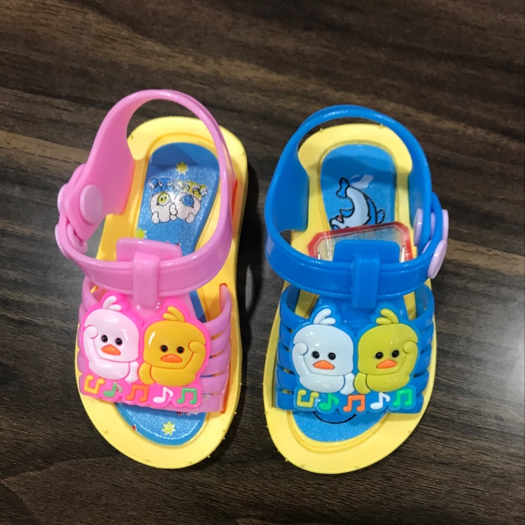 Little duck in children's sandals thumbnail