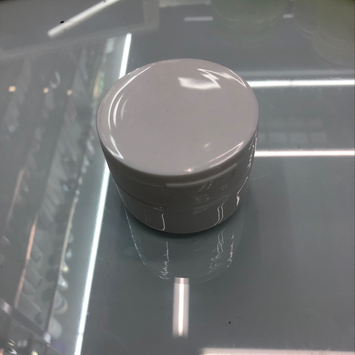 Beautiful white cream bottle thumbnail