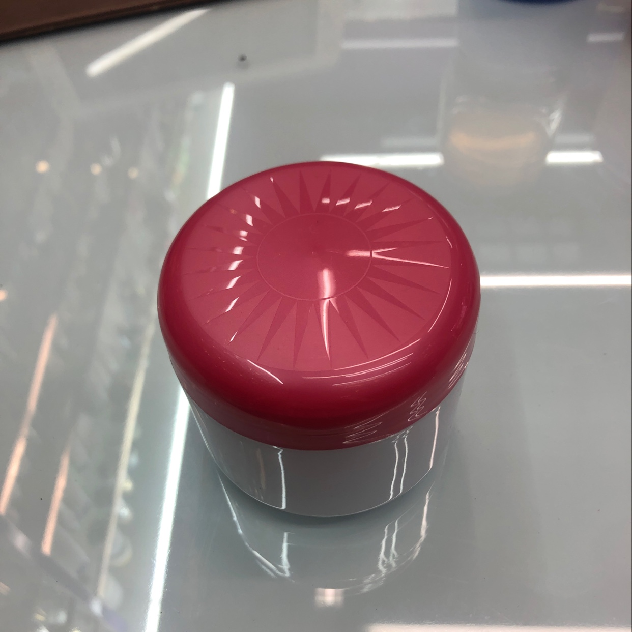 Red pink cream bottle thumbnail