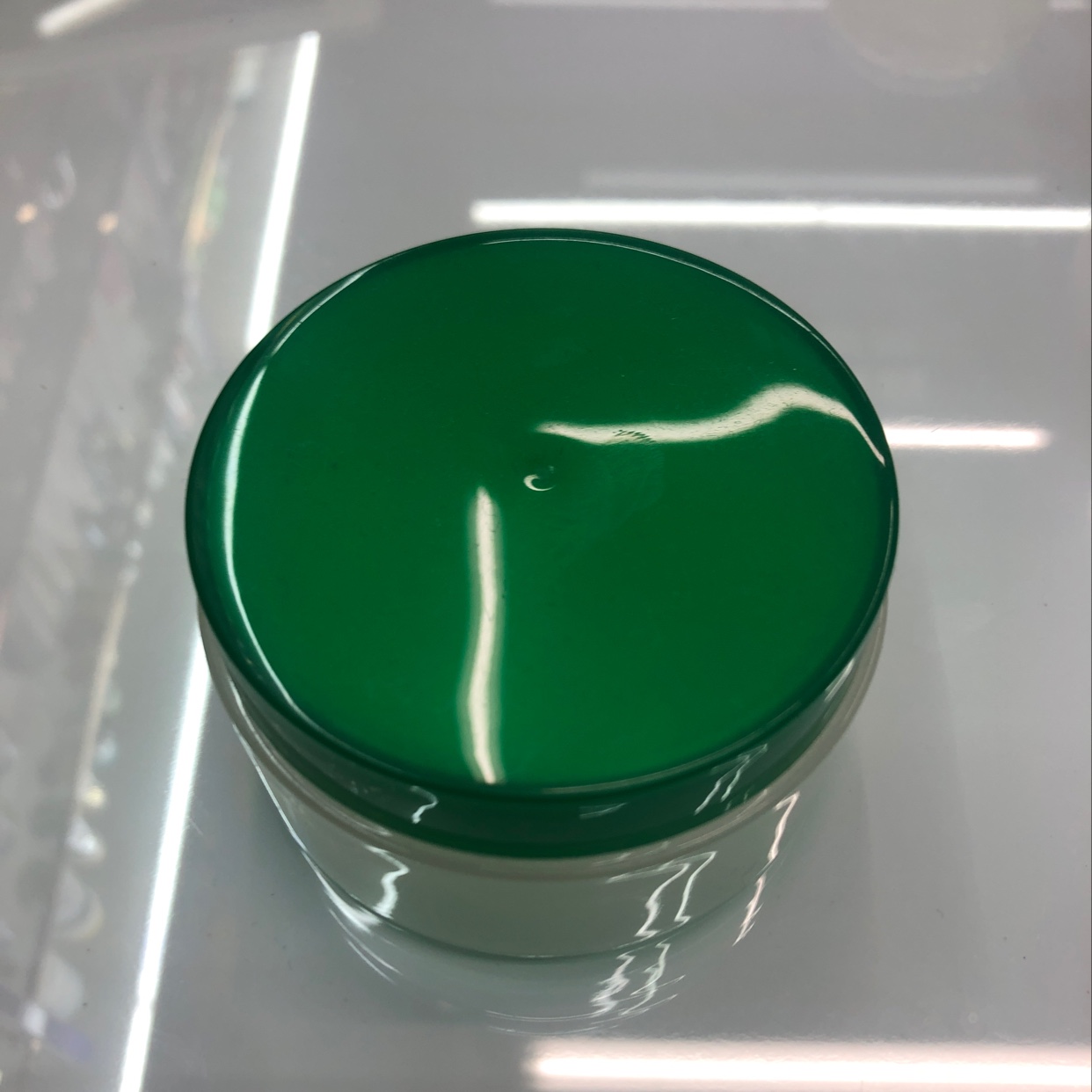 Green cream bottle