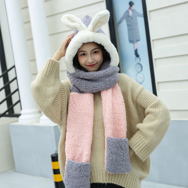 This is a cute and fluffy Japanese hooded scarf for girls. It is thick and warm for female students