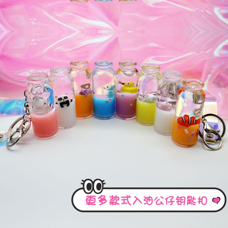 Ball type oil input key chain