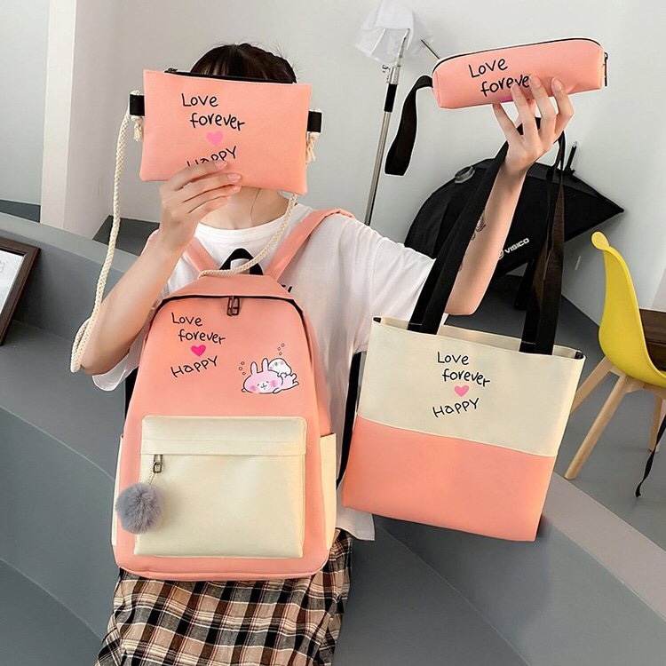 "School style four-piece student backpack HAPPY. Item Picture