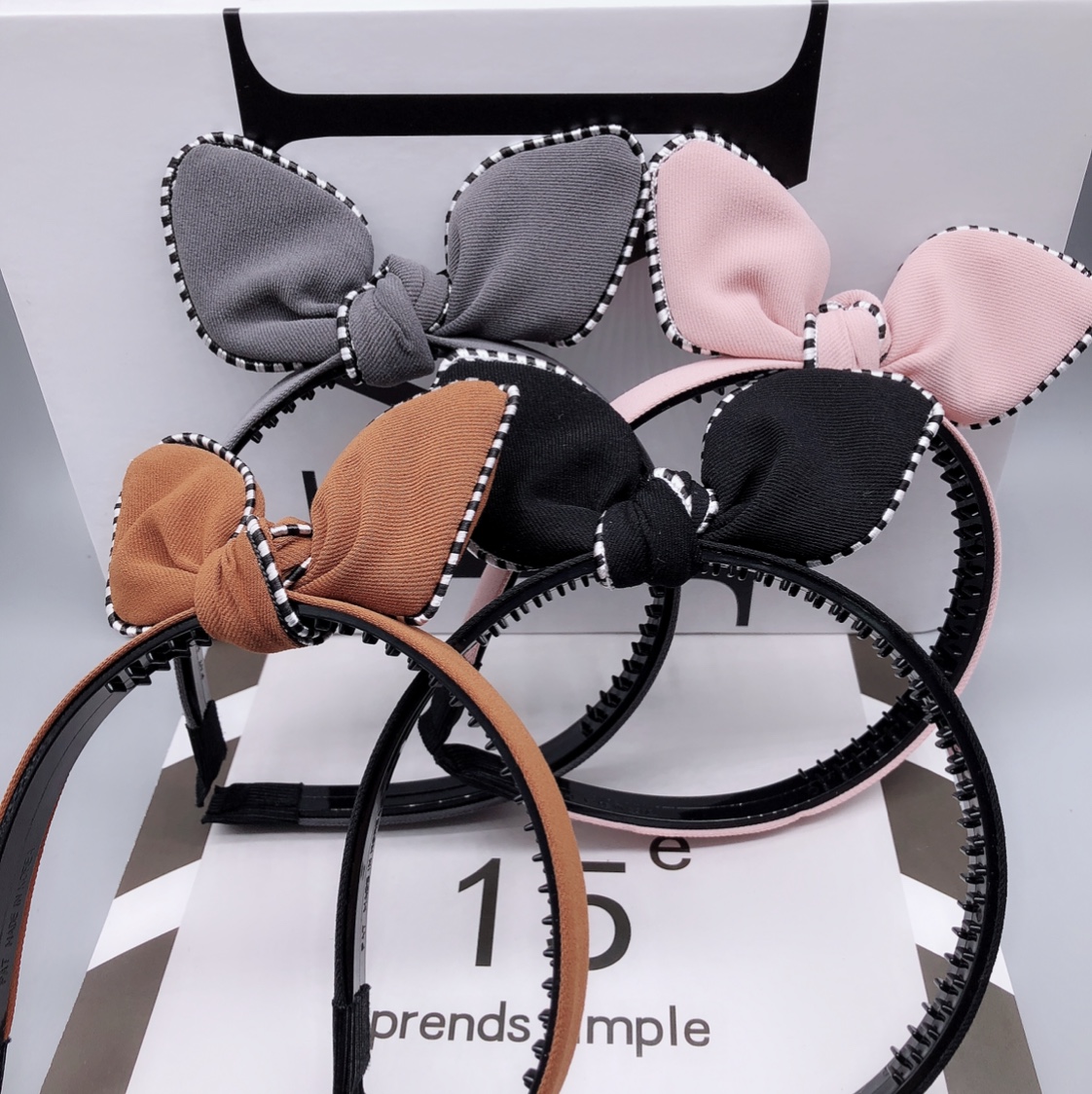 Black and white fringe hair band