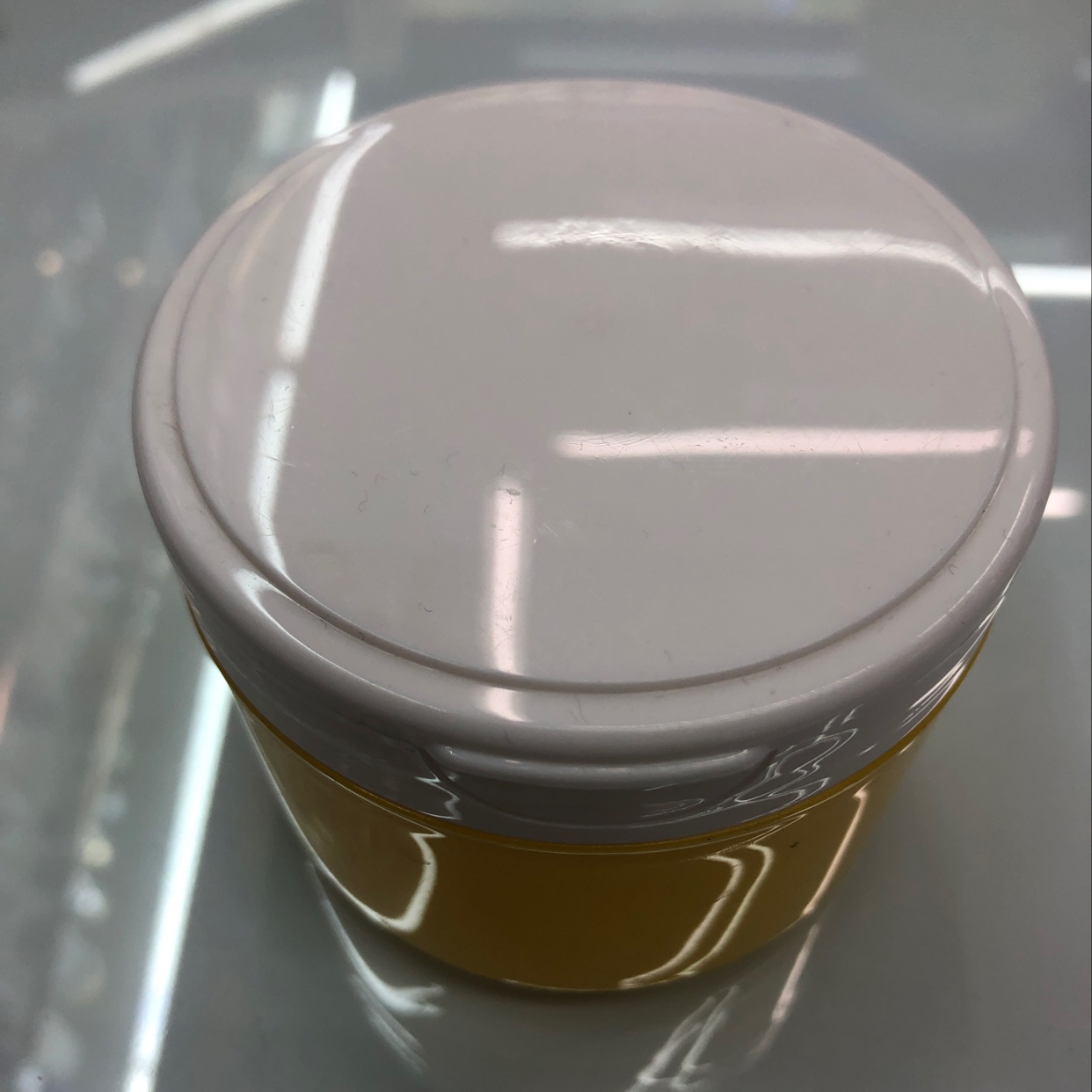 Yellow clamshell cream bottle thumbnail