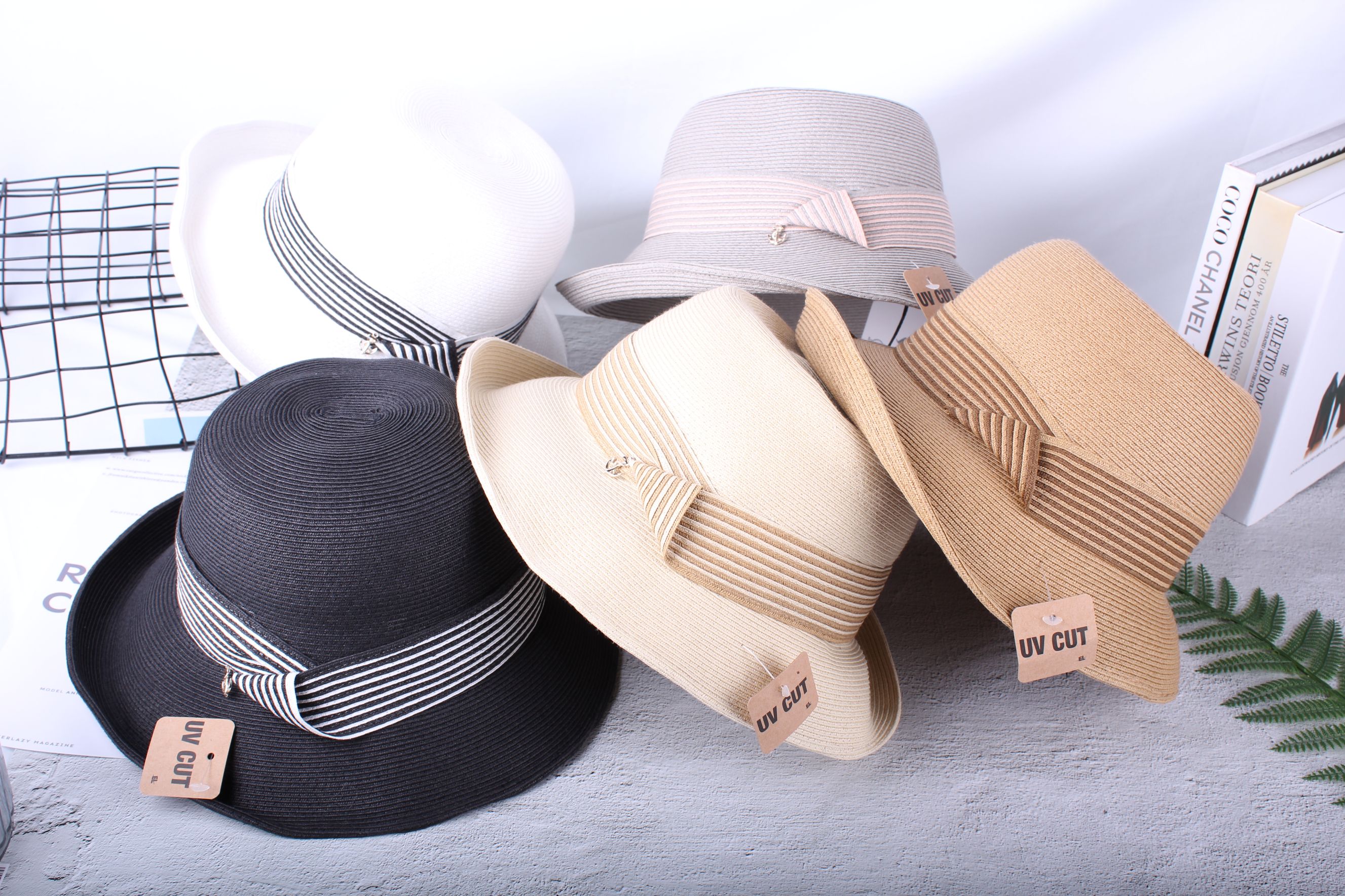 Rolled-up straw hat