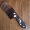 The natural peach wood comb with a handle and fine teeth, made with painting techniques, is an excellent gift for home use Specification image
