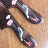 The natural peach wood comb with a handle and fine teeth, made with painting techniques, is an excellent gift for home use Application Scenario