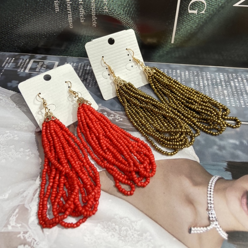 Rice bead bead tassel earrings