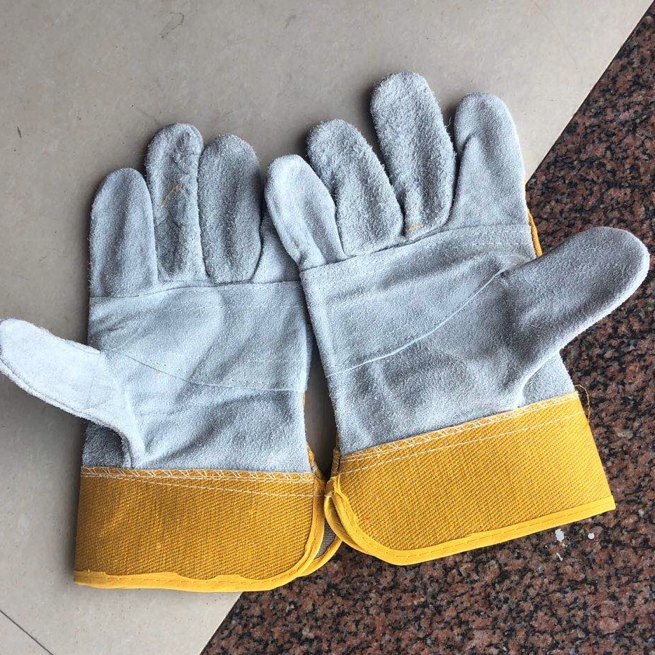 Yellow leather gloves with leather flaps thumbnail