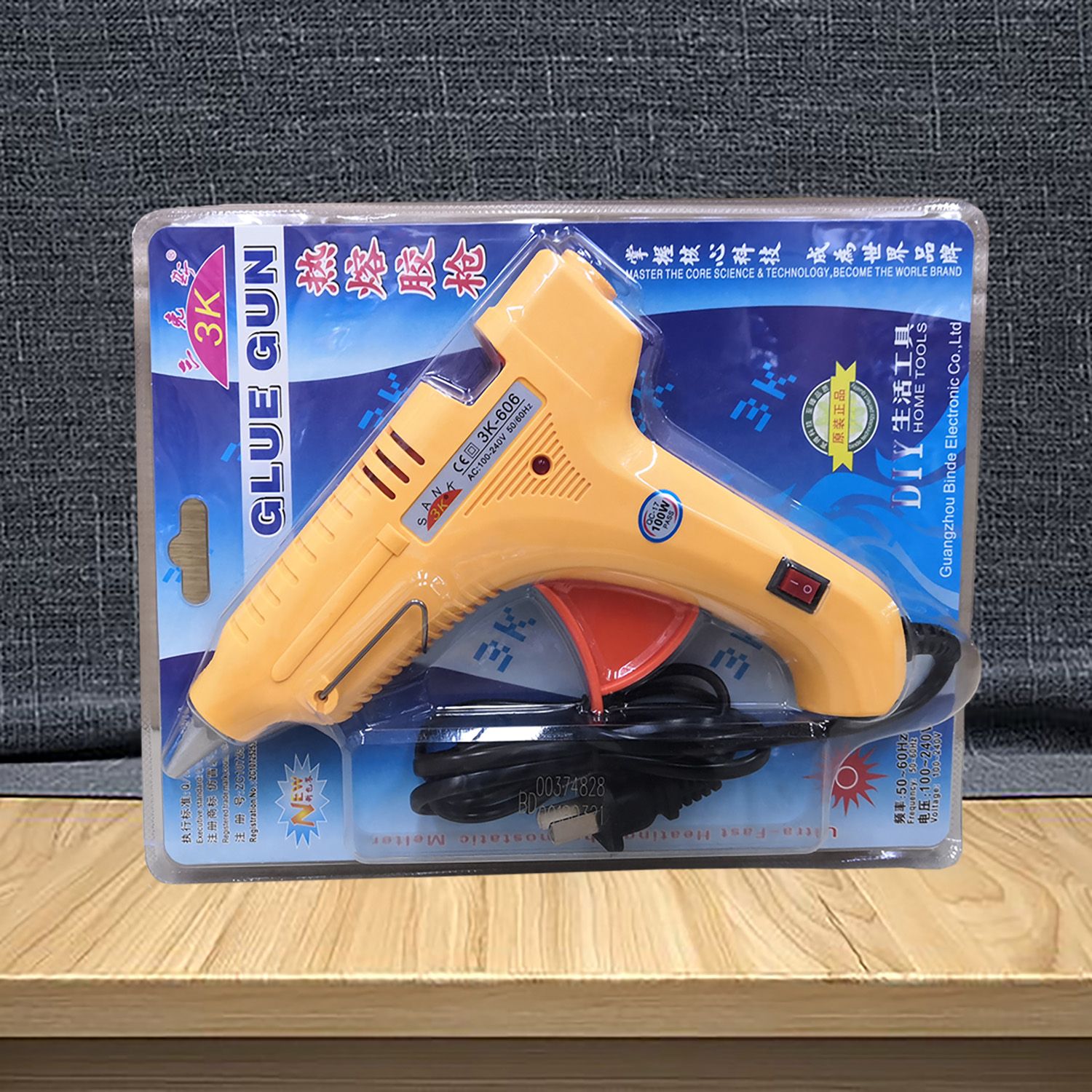 100W yellow hot melt glue gun with switch, suitable for 11mm glue sticks, quick heating, factory direct sales