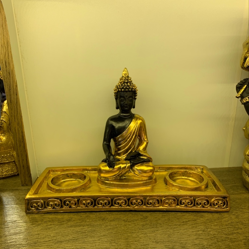 Buddha statue ornaments and candlestick handicrafts