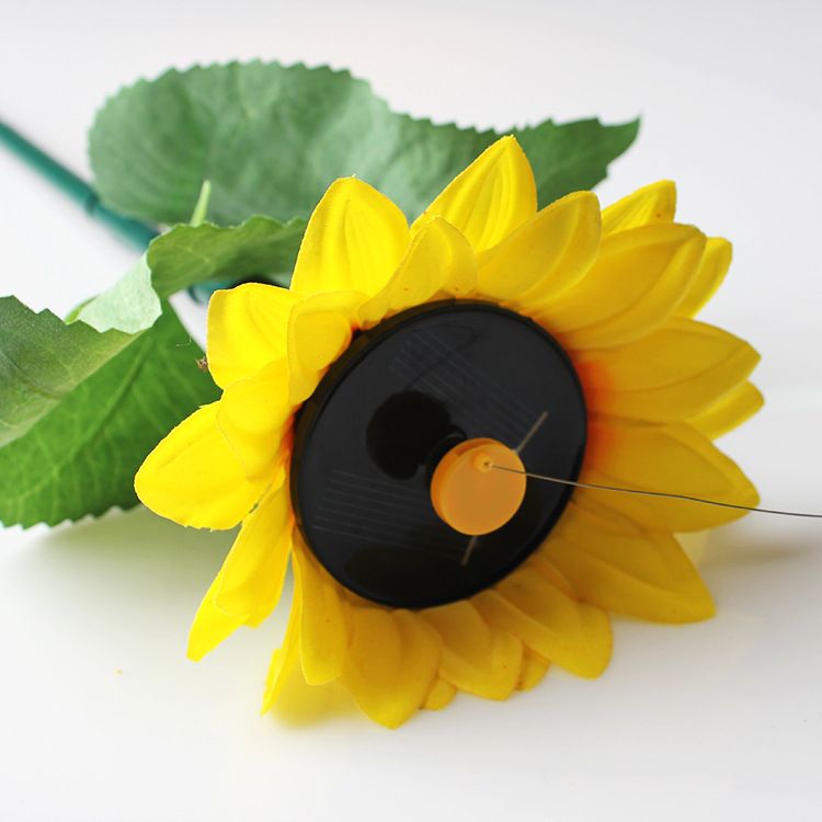 The latest solar-powered simulated hummingbird, simulated sunflower, electric flying plastic resin handicrafts, and flying bird toys details Picture
