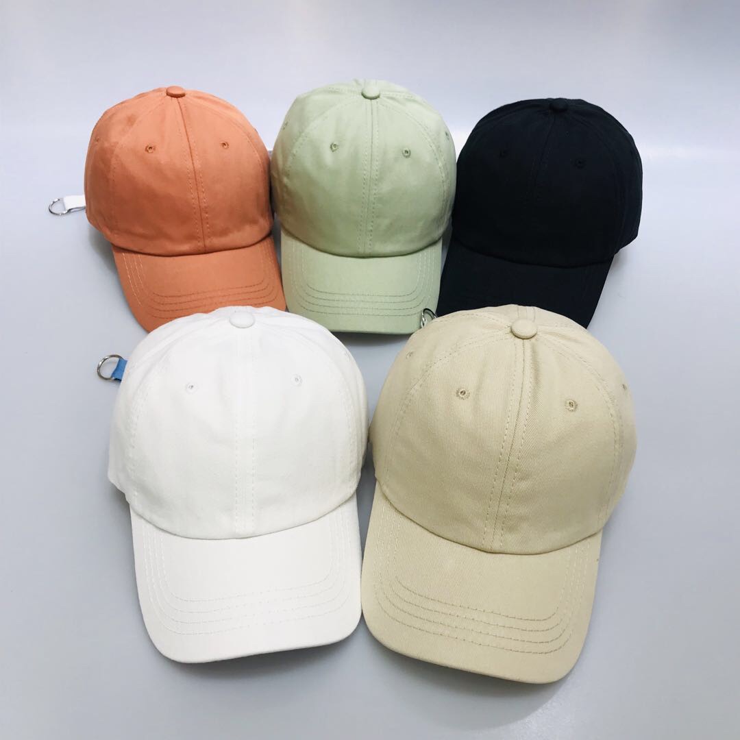 A baseball cap with a circular strap and a sun visor details Picture