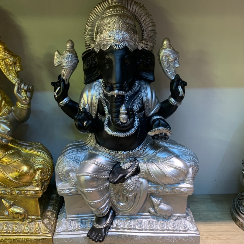 A home decoration and handicraft of GANESHA, the god of wealth from India and Southeast Asia details Picture