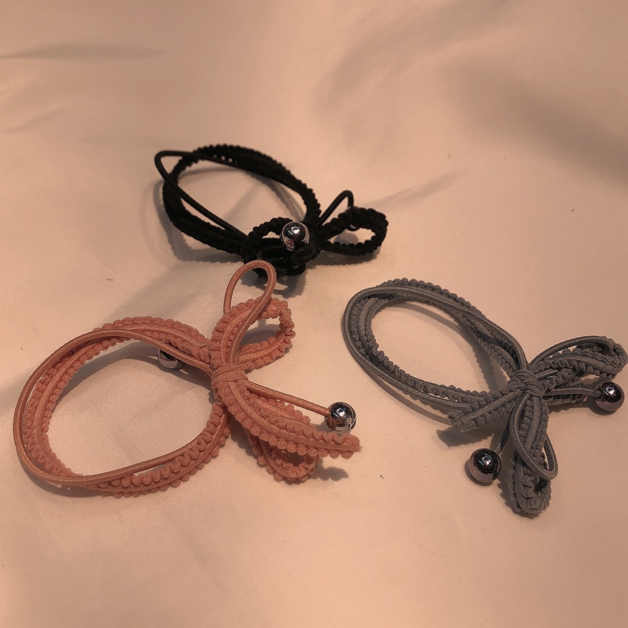 100 hand-tied bow leather band hair ties in mixed colors for wholesale Specification image
