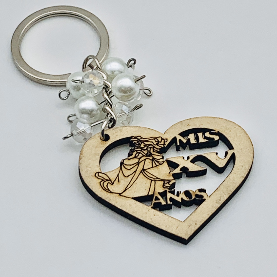 A wooden keychain, a heart-shaped keychain as a gift for visitors to the Virgin Mary