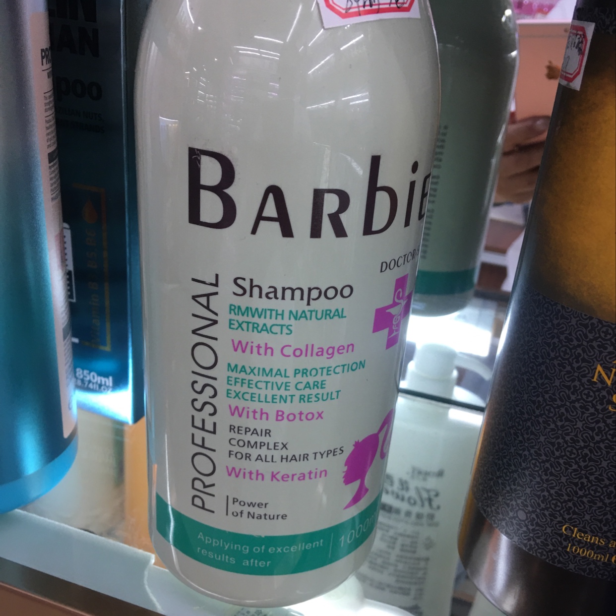 天然萃取精华洗发水有效护理各种头发含有胶原蛋白成分1000ml.