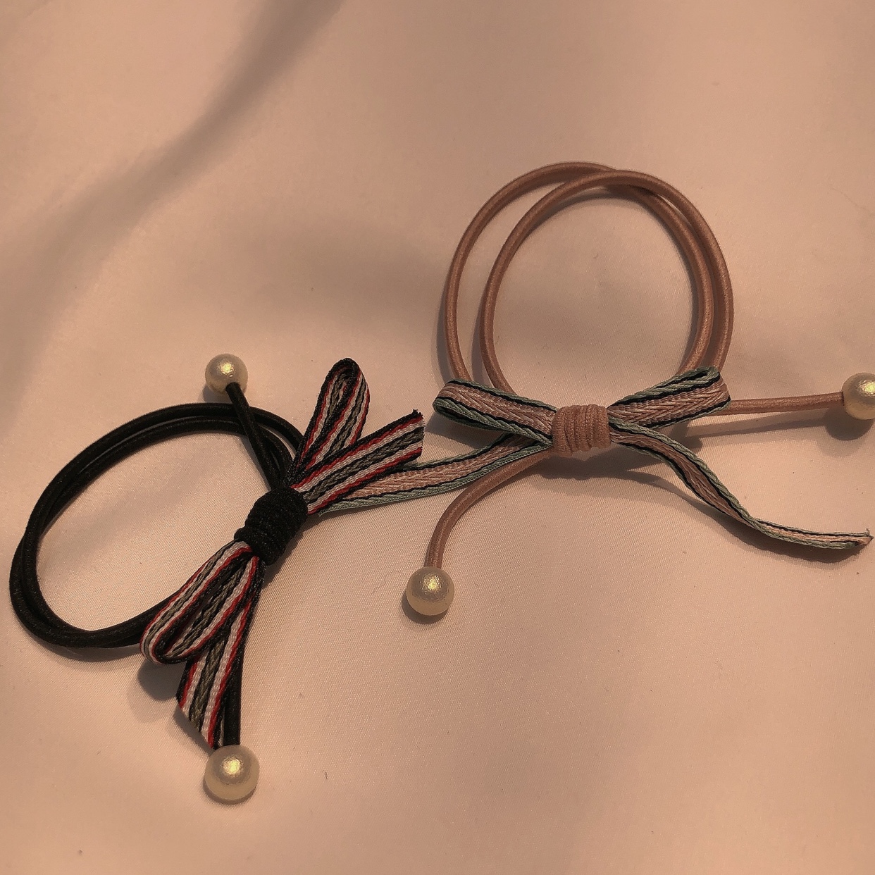 100 hand-tied pearl hair ties with ribbon bows and rubber bands in mixed colors for wholesale