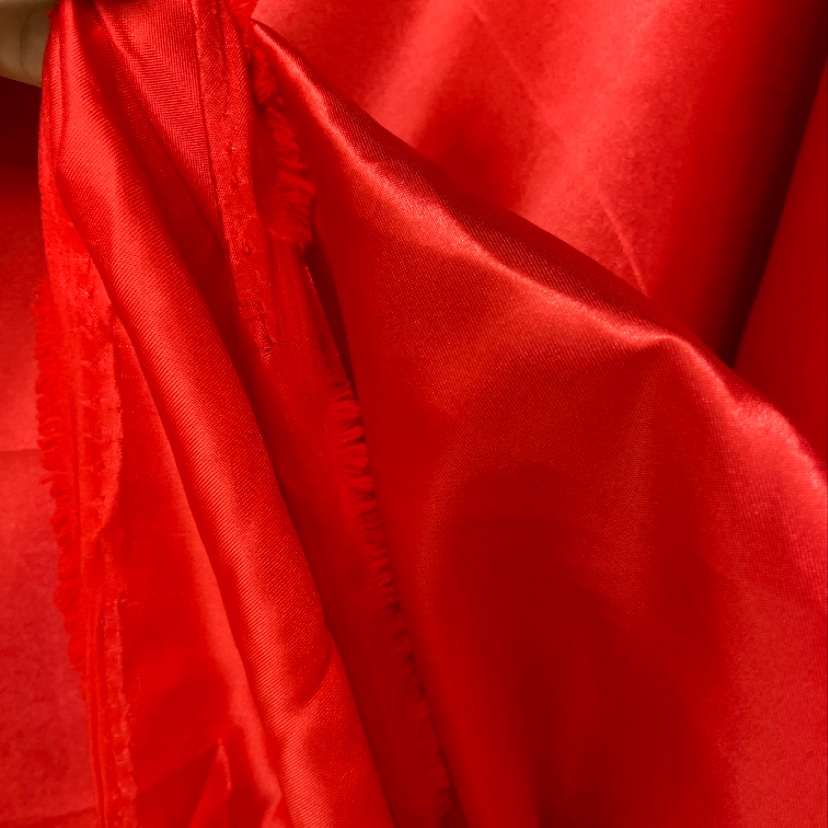 Red satin fabric for clothing, headwear, accessories and handicrafts details Picture