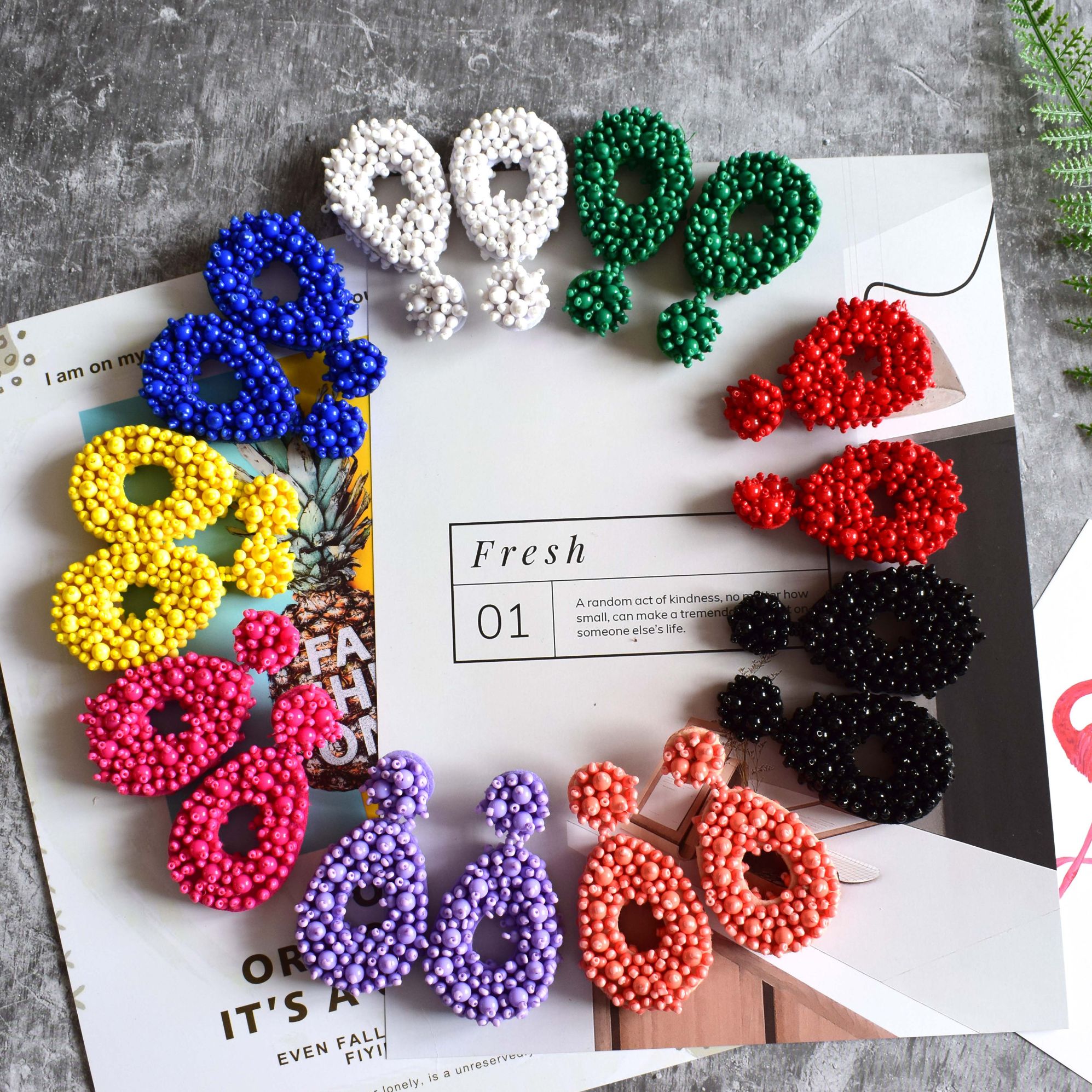 Factory direct sales of rice bead teardrop earrings, oval-shaped exaggerated retro pure handcrafted earrings, rice bead teardrop-shaped earrings