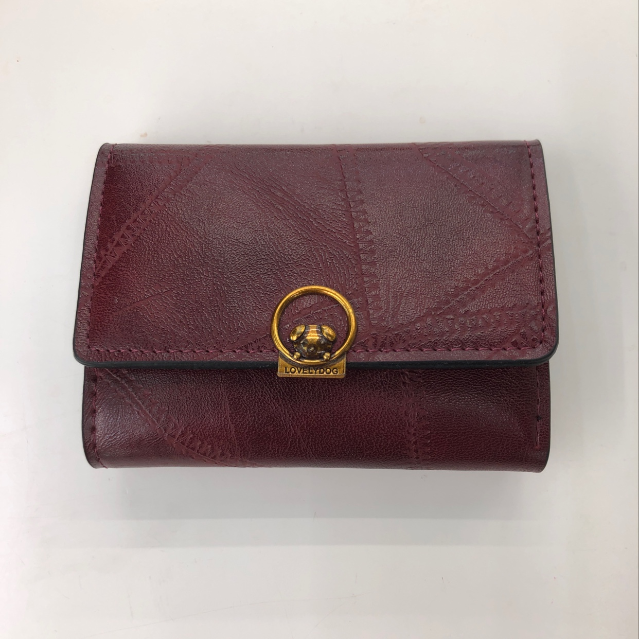 A retro short little dog wallet